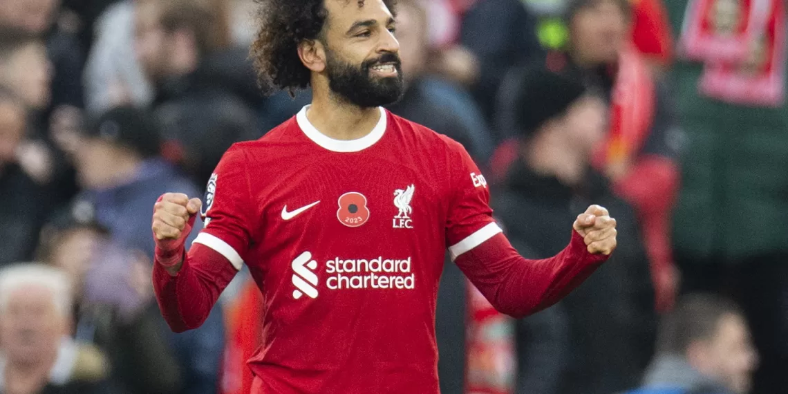 epa10971681 Mohamed Salah of Liverpool celebrates after scoring the 1-0 opening goal during the English Premier League soccer match between Liverpool FC and Brentford FC, in Liverpool, Britain, 12 November 2023.  EPA/PETER POWELL EDITORIAL USE ONLY. No use with unauthorized audio, video, data, fixture lists, club/league logos or 'live' services. Online in-match use limited to 120 images, no video emulation. No use in betting, games or single club/league/player publications.