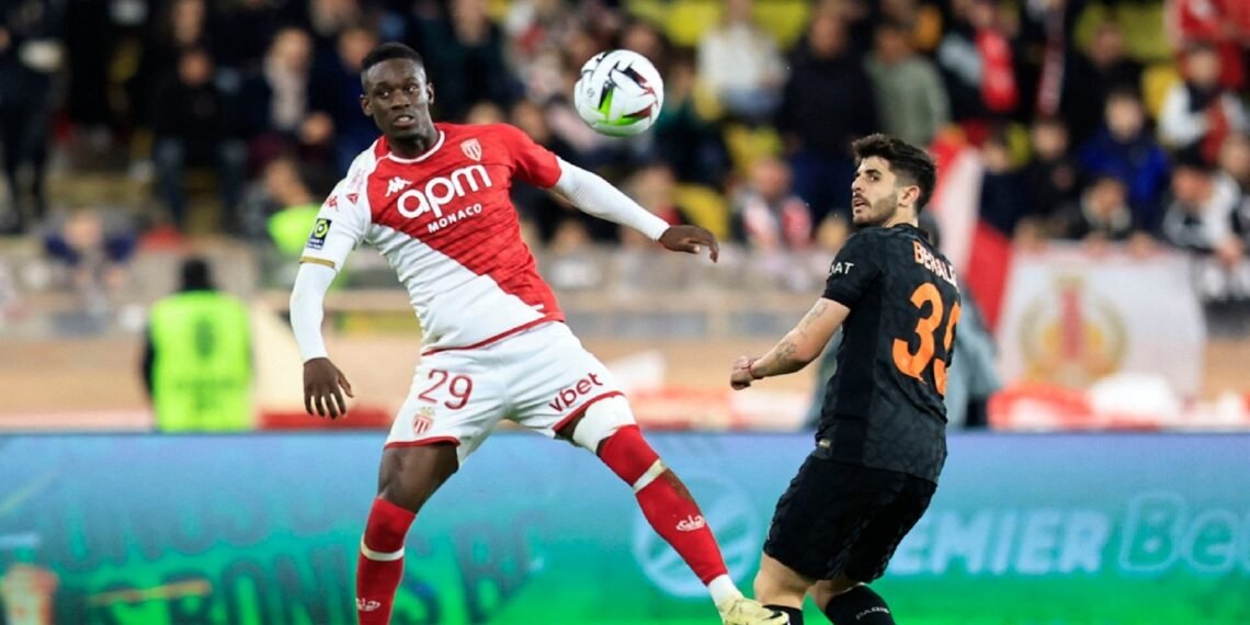 Monaco's US forward #29 Folarin Balogun (L) fights for the ball with Paris Saint-Germain's Brazilian defender #35 Lucas Beraldo during the French L1 football match between AS Monaco and Paris Saint-Germain (PSG) at the Louis II Stadium (Stade Louis II) in the Principality of Monaco on March 1, 2024. (Photo by Valery HACHE / AFP)